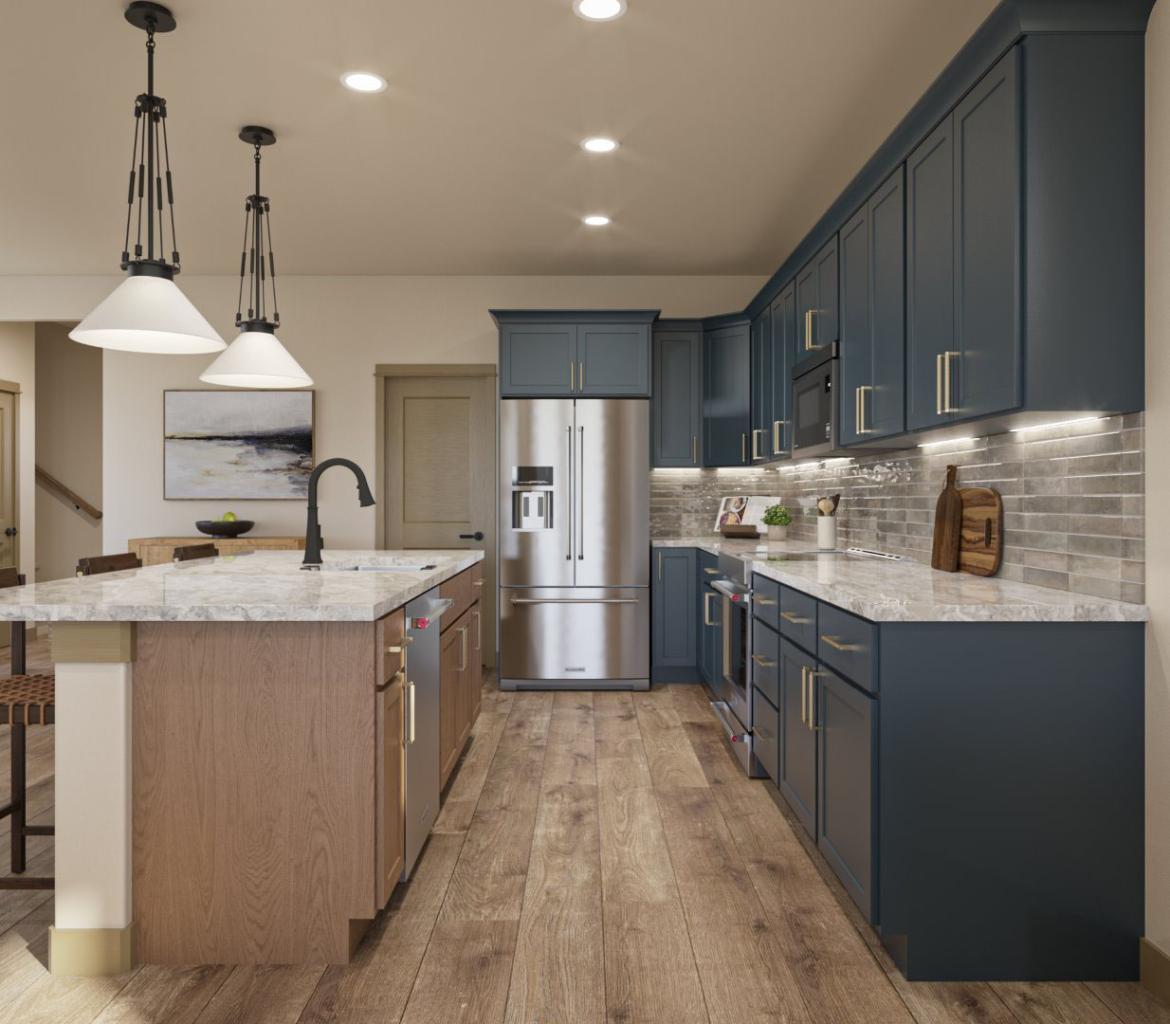 Spacious kitchen in the Aspen home featuring blue cabinets, a central island, and modern appliances. The layout highlights open counter space, bright lighting, and contemporary design elements.